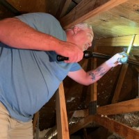 Robert Allen performing a home inspection